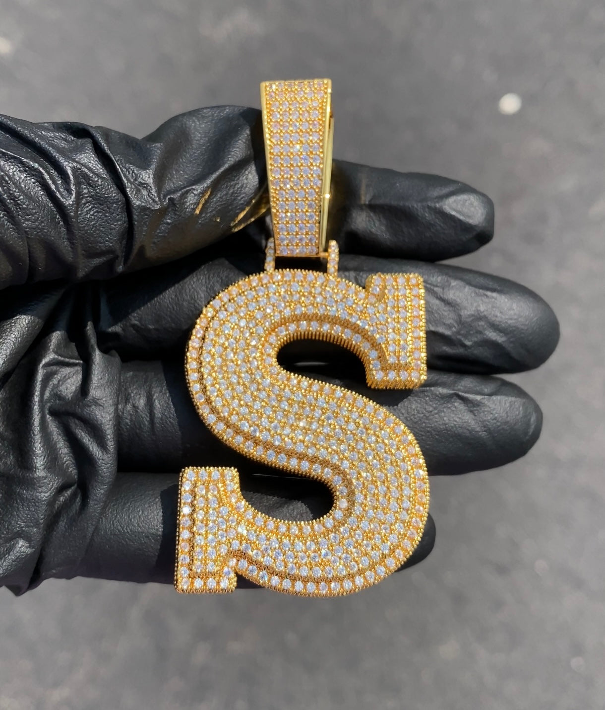 Custom initial pendant worn on chain by Charmbox Men