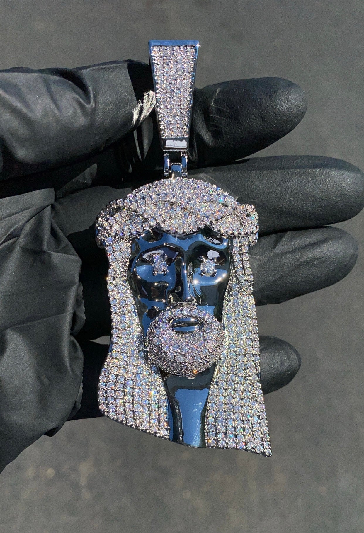 Jesus head pendant worn on Cuban chain by Charmbox Men