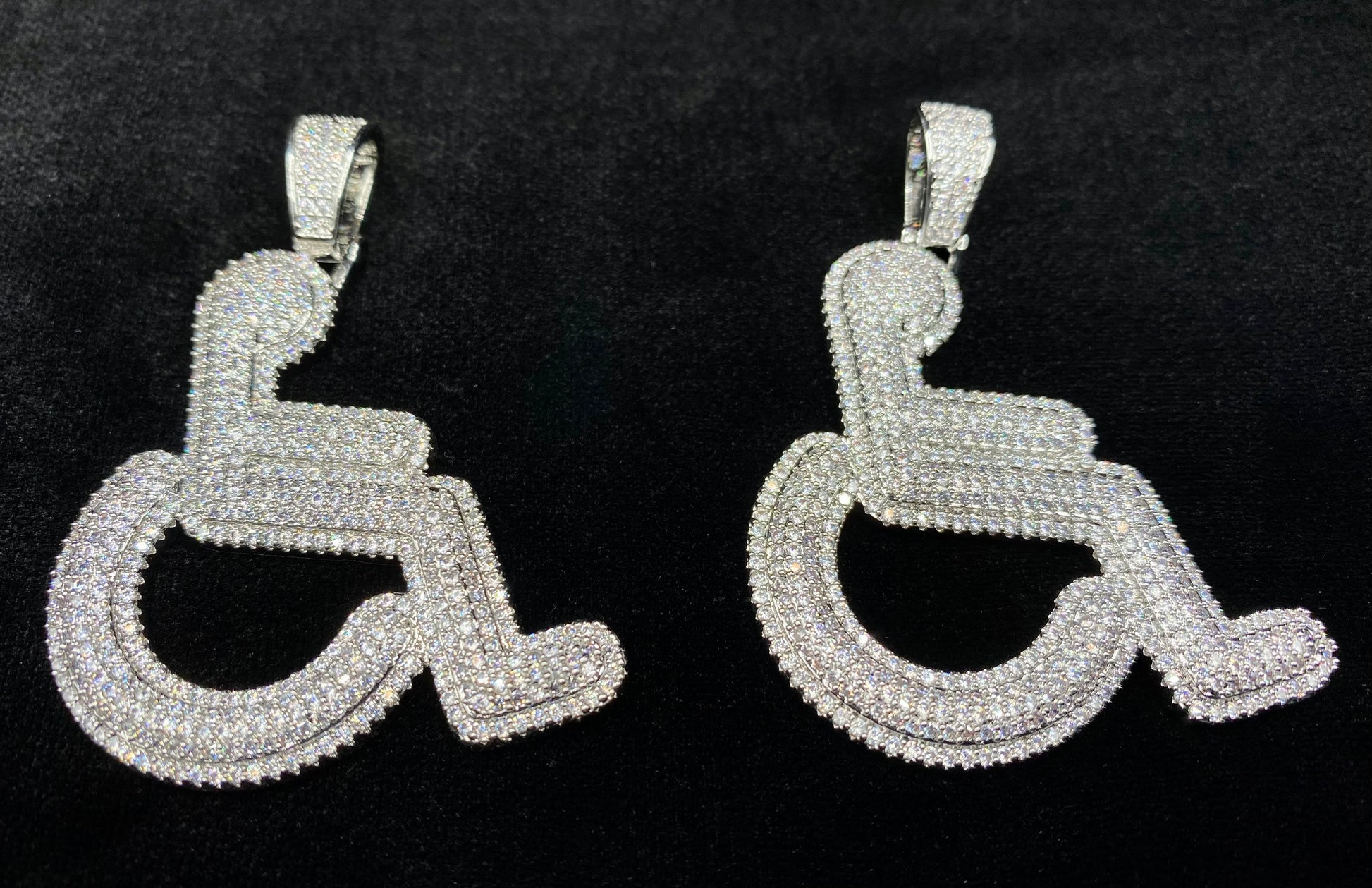 Wheelchair pendant worn on chain by Charmbox Men
