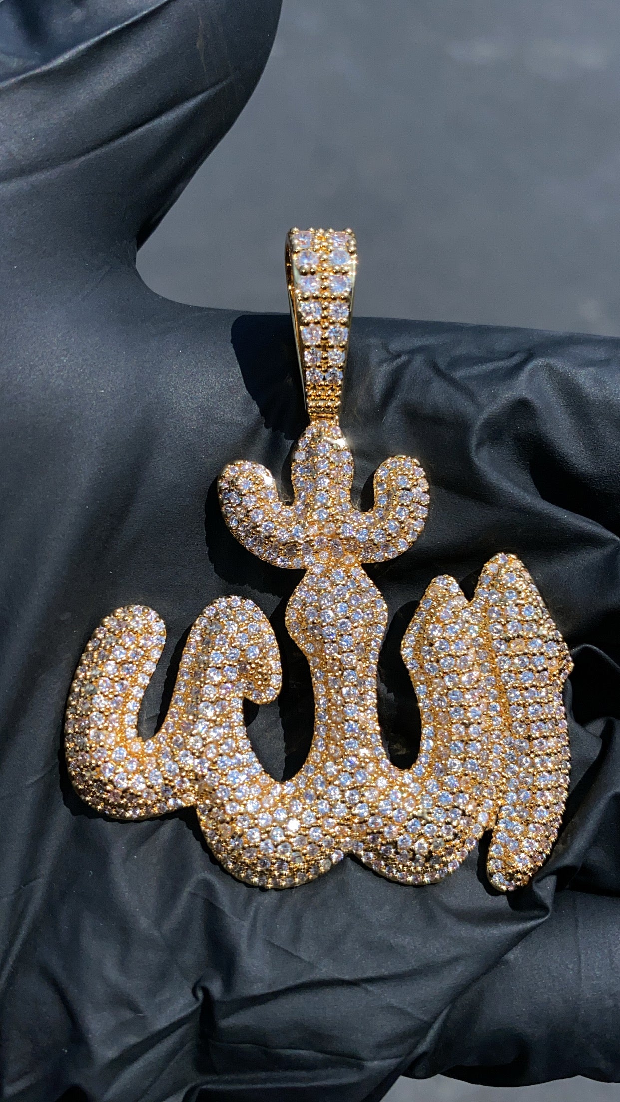 Allah pendant worn on chain by Charmbox Men